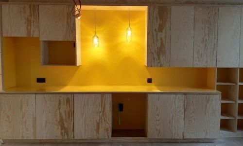 production of a complete kitchen in natural wood for social housing